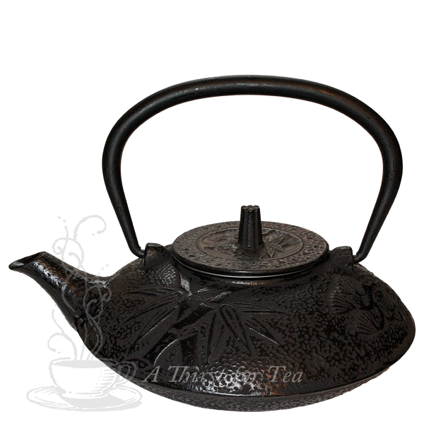 Our Black Bamboo Cast Iron Teapot, or Tetsubin, holds 20.4 oz.